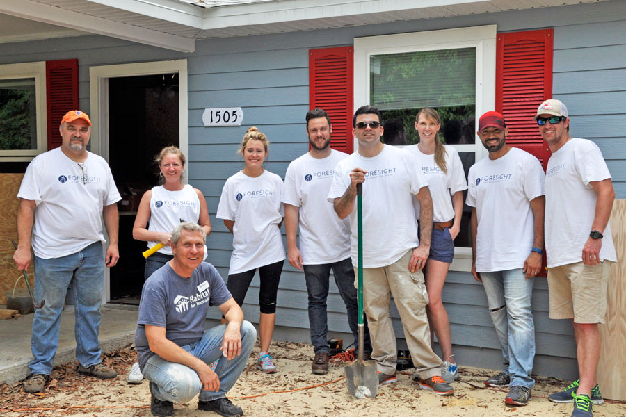 Foresight employees volunteering with Habitat for Humanity
