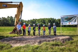 Clay County County Commissioners, Sheriff's Office and Foresight holds shovels into the dirt of what will become the new gun range.