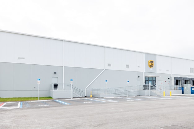 West exterior entrance and parking at UPS Air Cargo warehouse at Tampa International Airport